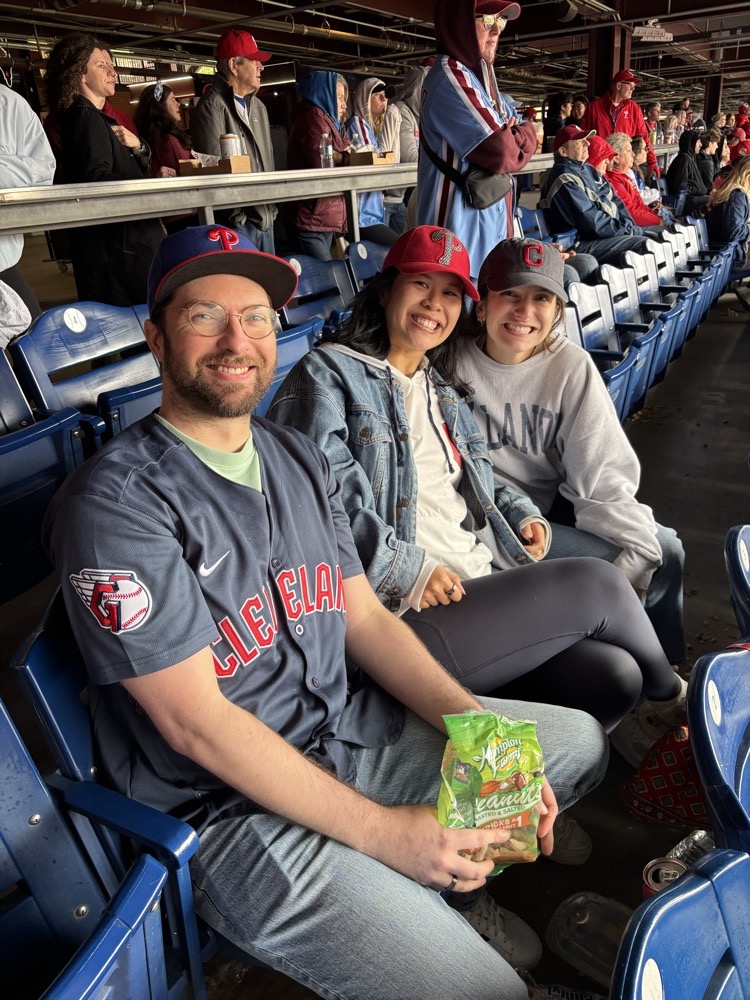 Derek and Nhi at a baseball game